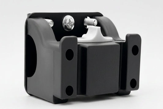 Black metal bracket with white component on a white background