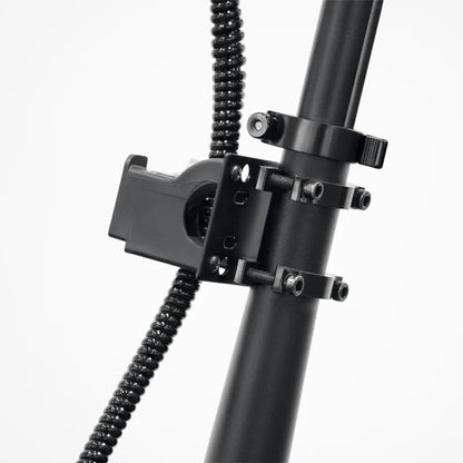 Close-up of a black metal stand with adjustable arm on a white background