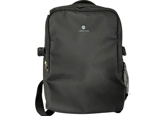 A black nylon backpack with a top handle, adjustable shoulder strap, and a small white logo on the front, shown against a plain white background with a blue 'AQS' label in the top-left corner.